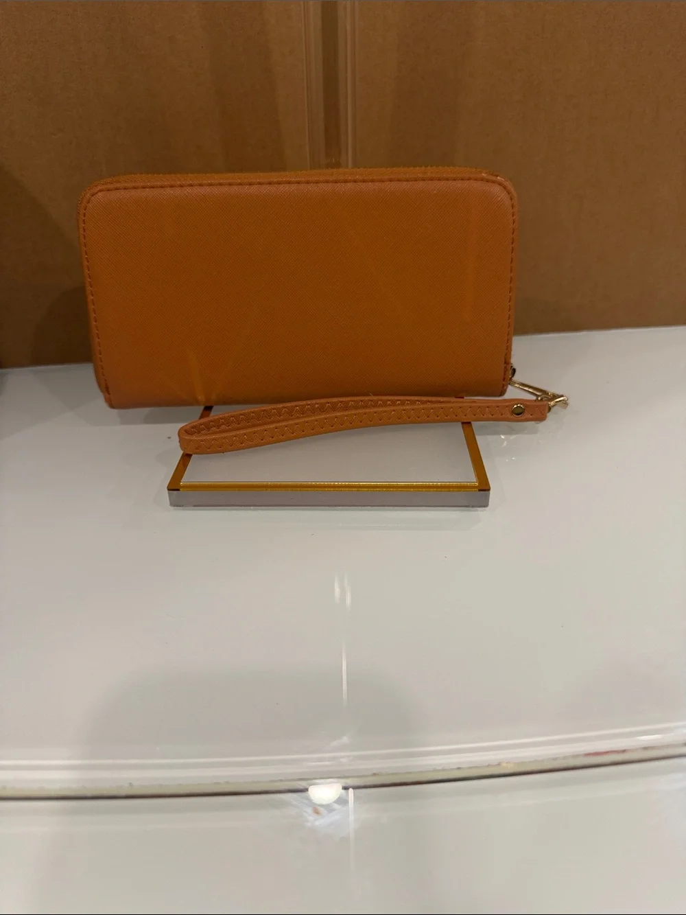 Tory Burch Caramel Tan Wristlet with Gold Logo Medallion
